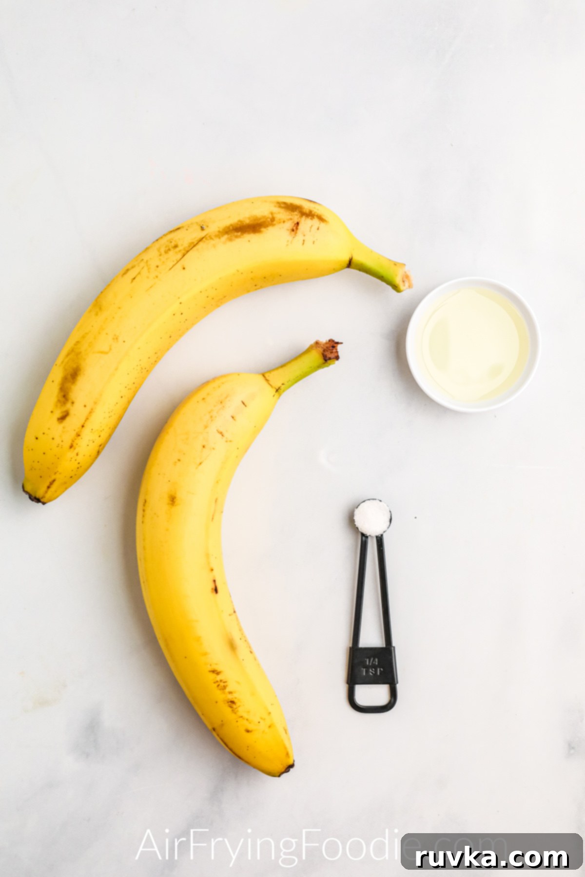 Crispy Air Fryer Banana Chips 4 Ingredients needed to make banana chips in the air fryer - bananas, kosher salt, and olive oil