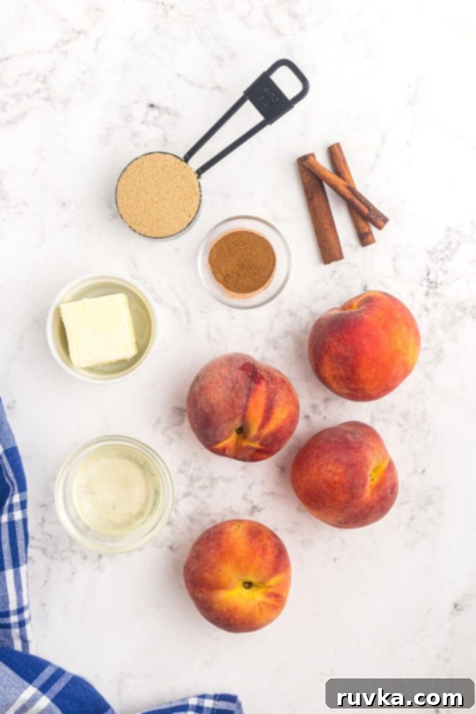 Golden Air-Fried Peaches 3 Ingredients needed to make air fryer peaches on a white marble table