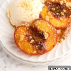 Golden Air-Fried Peaches 10 Golden juicy peaches on a white plate and served with vanilla ice cream