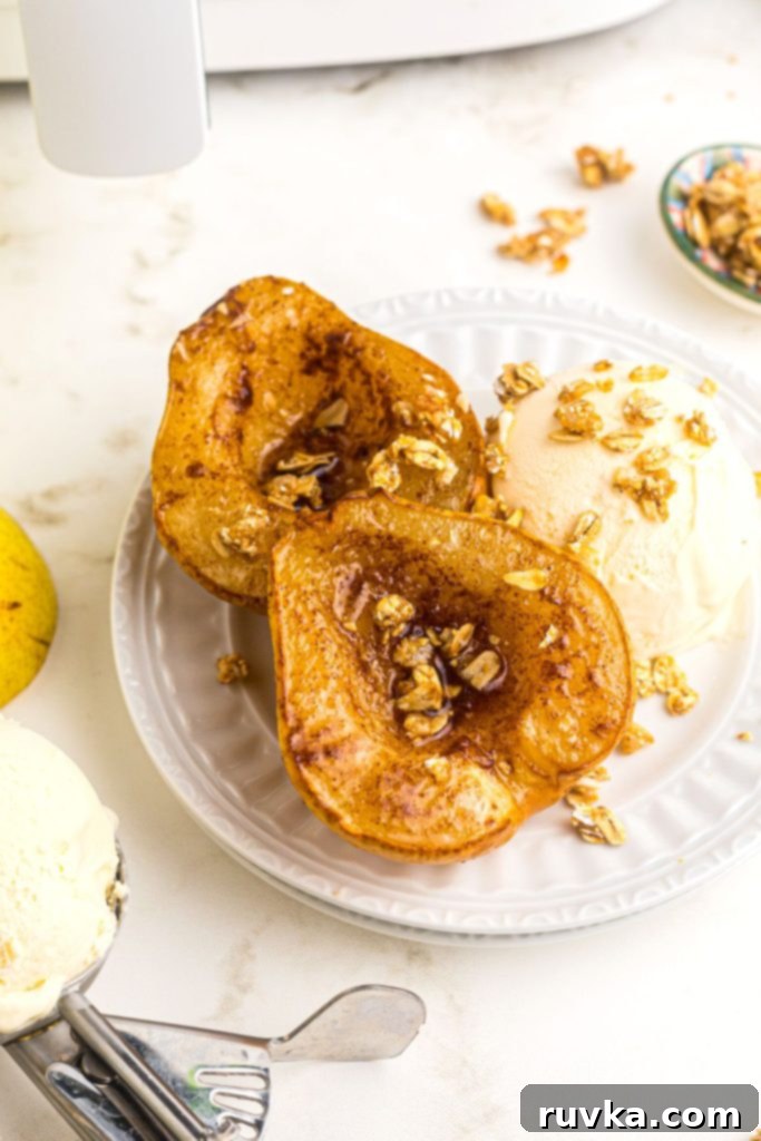 Golden Air Fryer Pears 2 Golden juicy pears sliced and sprinkled with granola and served with vanilla ice cream.