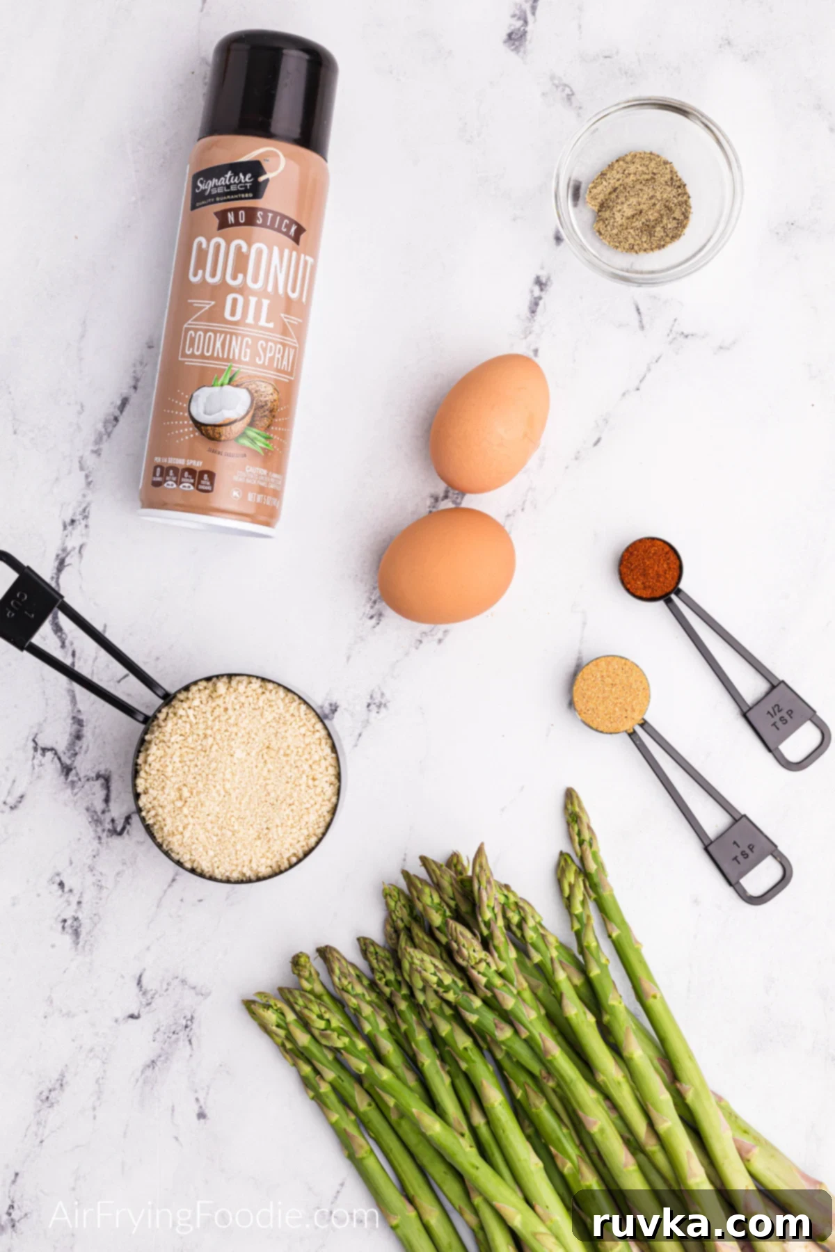 Crispy Air-Fried Asparagus Sticks 4 Asparagus spears, eggs, breadcrumbs, coconut oil, and seasonings needed to make air fryer asparagus.