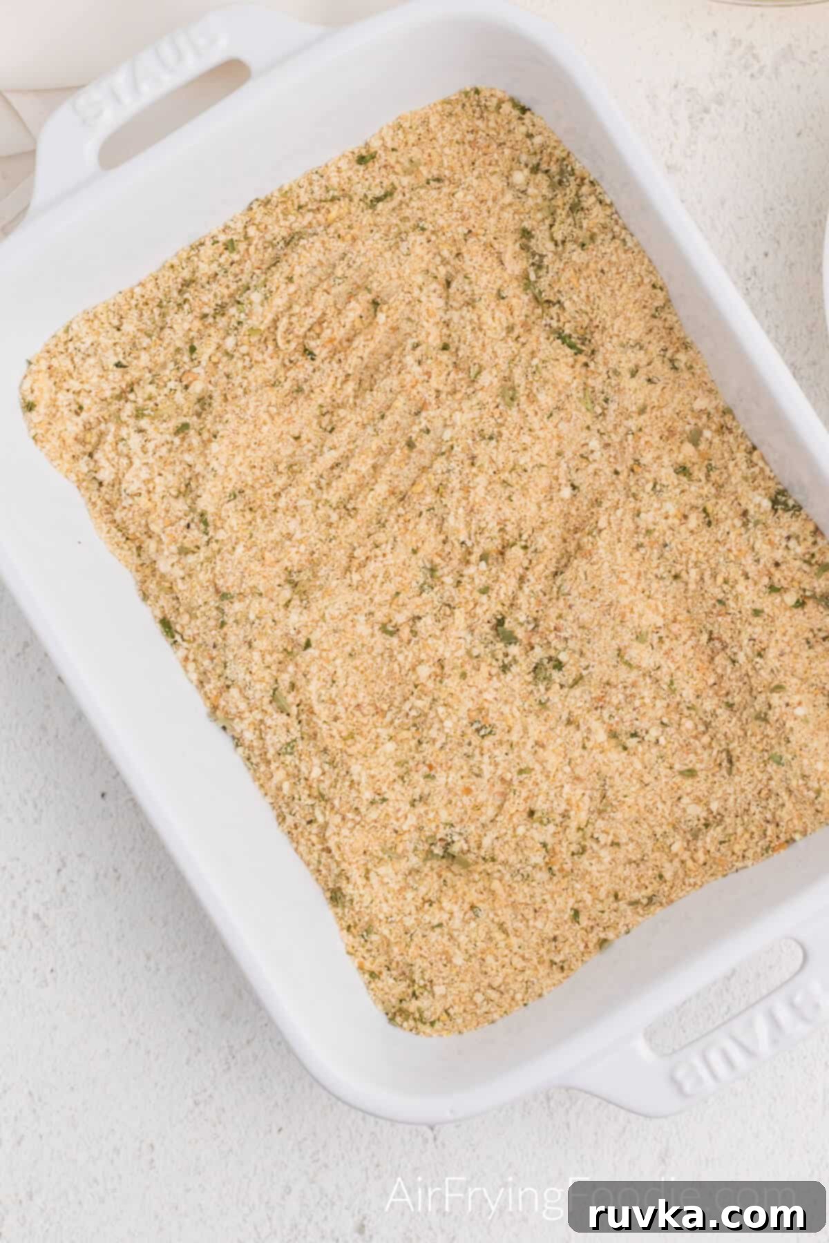 Golden Air-Fried Ravioli Bites 4 Dish with seasonings and breadcrumbs mixed together to bread ravioli.