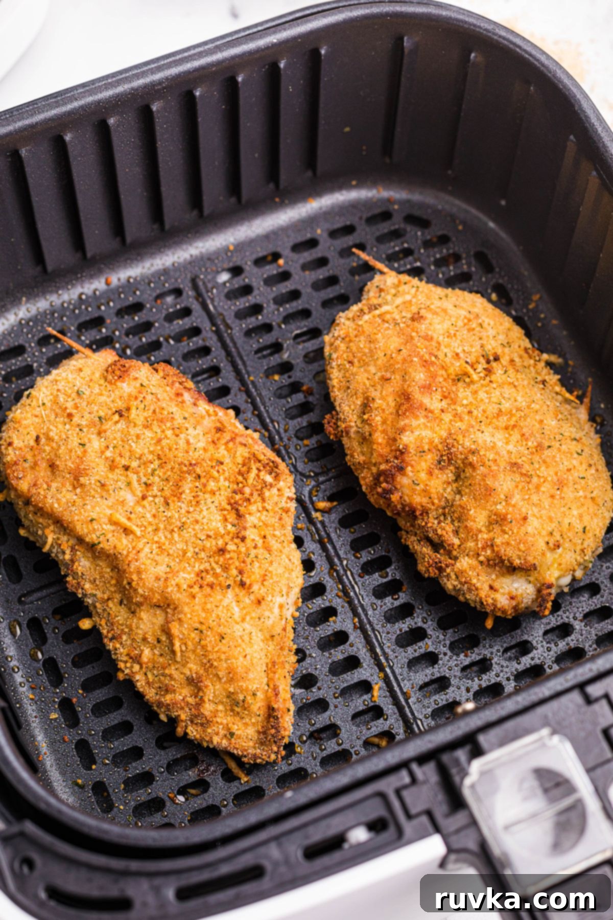 Crispy Air Fryer Chicken Cordon Bleu 10 Crispy cooked chicken in the air fryer basket.