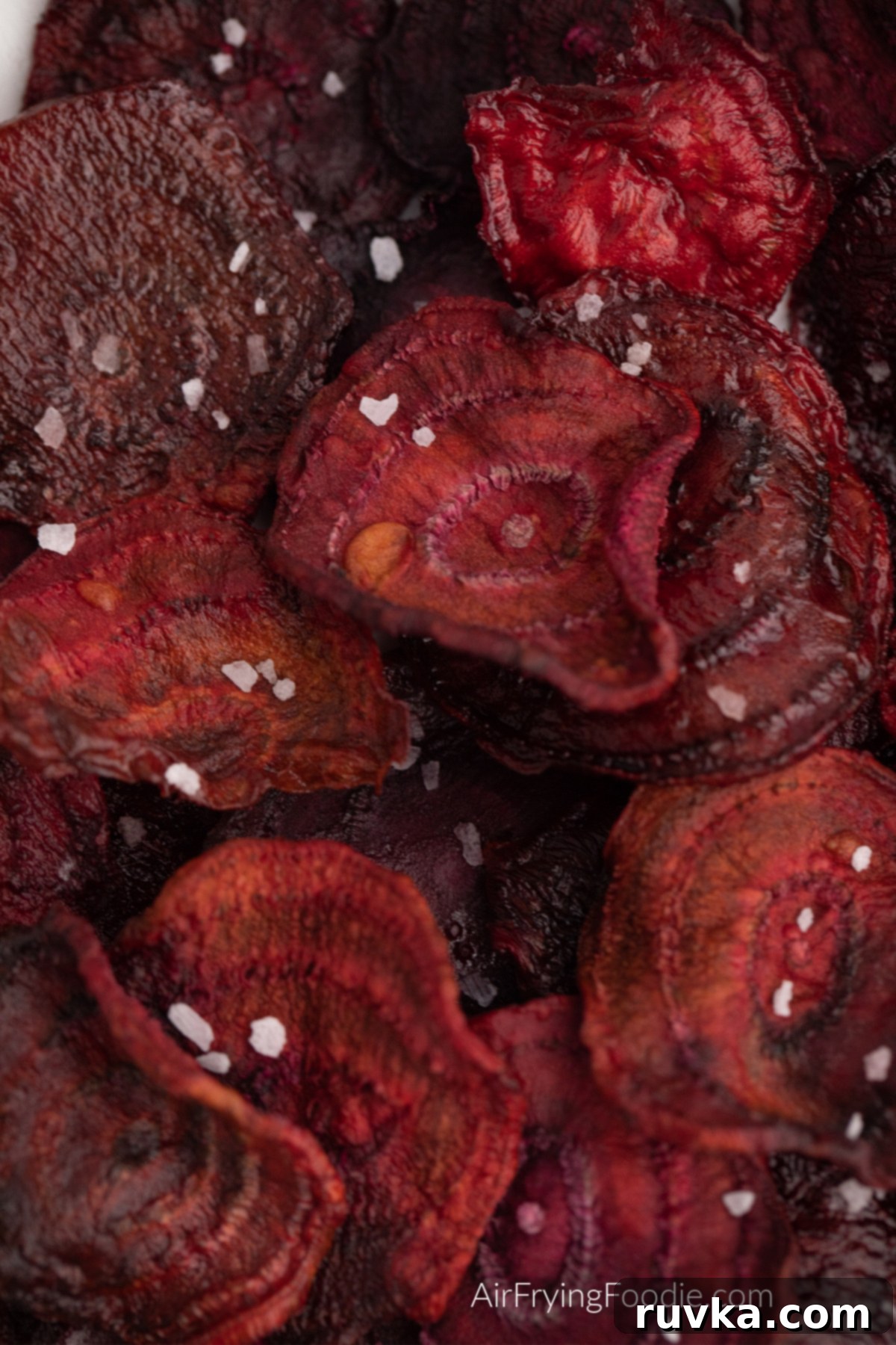 Crispy Air Fryer Beet Chips 2 Close up photo of air fried beet chips with kosher salt sprinkled on top.