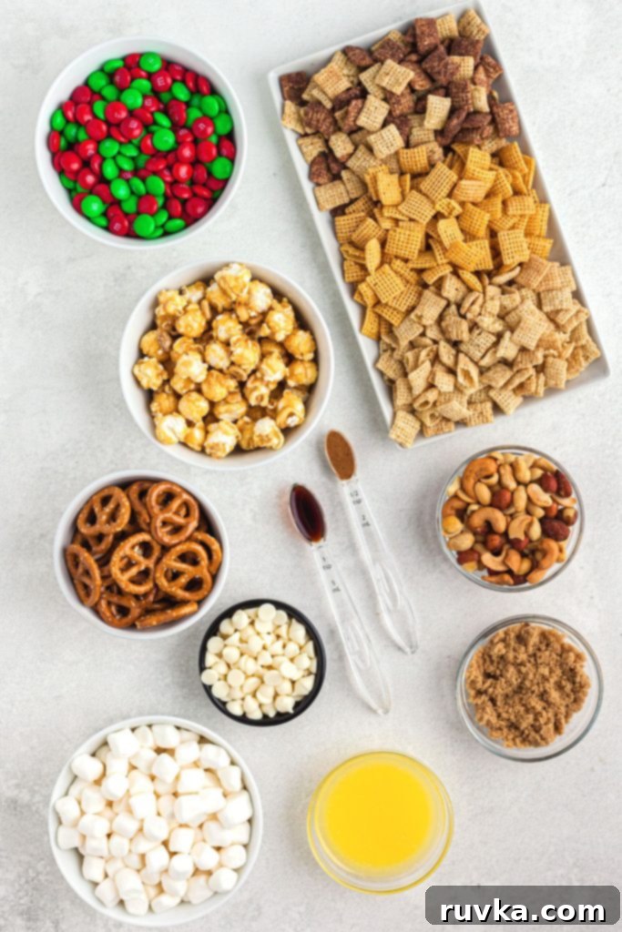 Crispy Air Fryer Reindeer Chow 3 Ingredients needed to make reindeer chow, measured out on a white marble table