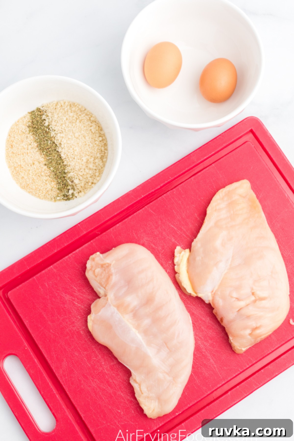 Crispy Air Fryer Chicken Parmesan 3 Ingredients needed to make chicken parmesan in the air fryer.