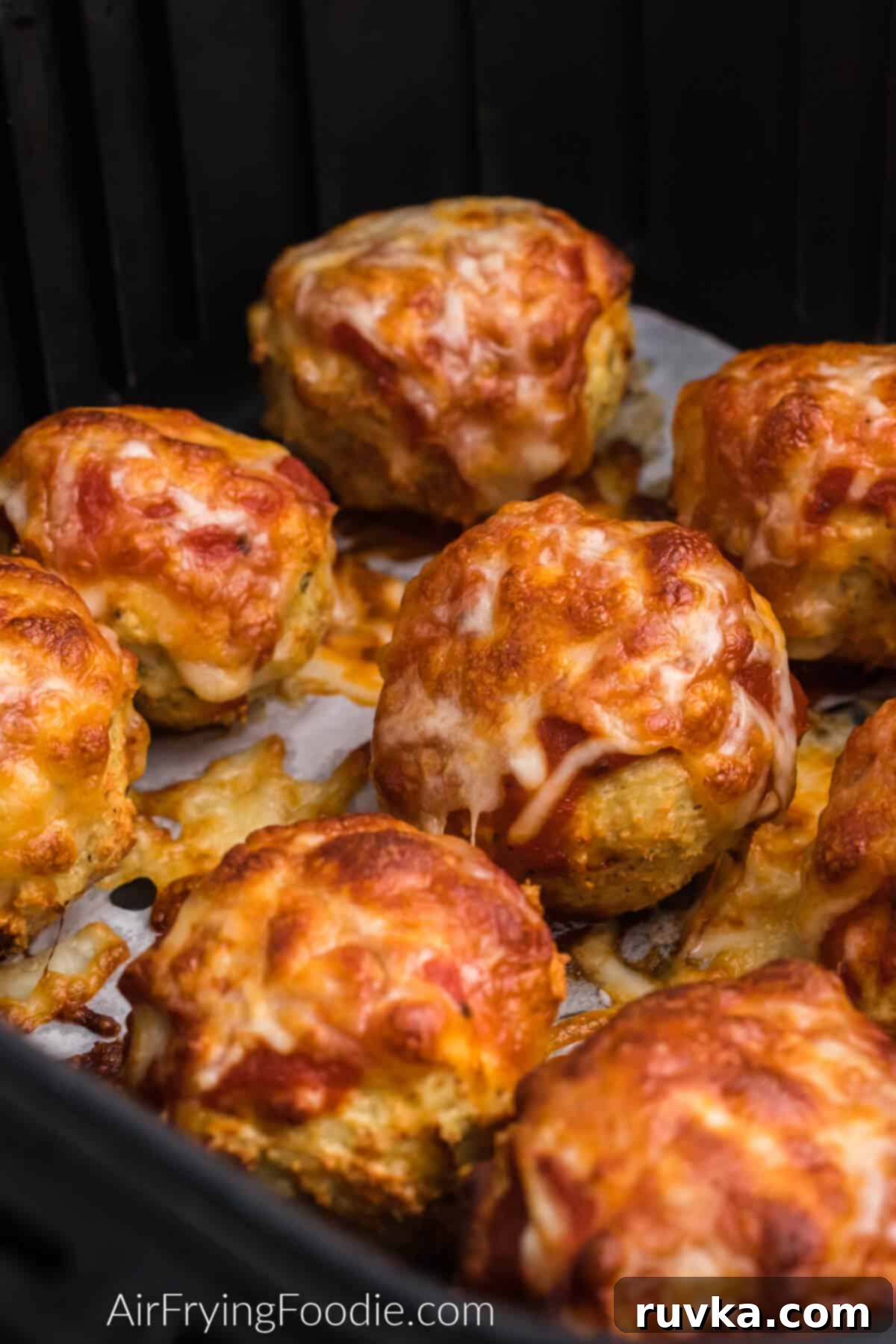 Crispy Air Fryer Chicken Parmesan Meatballs 6 Fully cooked air fryer chicken meatballs topped with marinara and cheese and ready to be served.