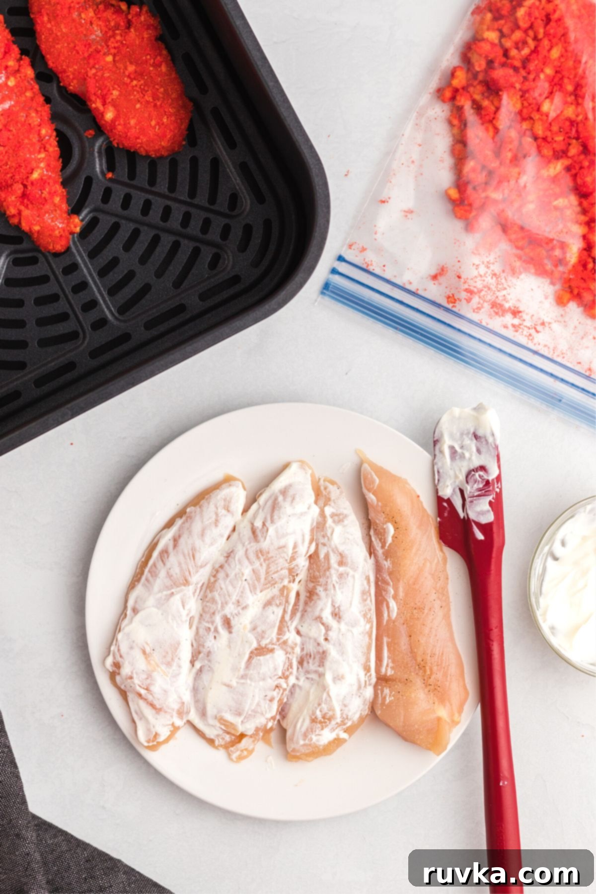 Crispy Air Fried Flamin Hot Cheetos Chicken 5 Coat each piece of chicken with mayonnaise