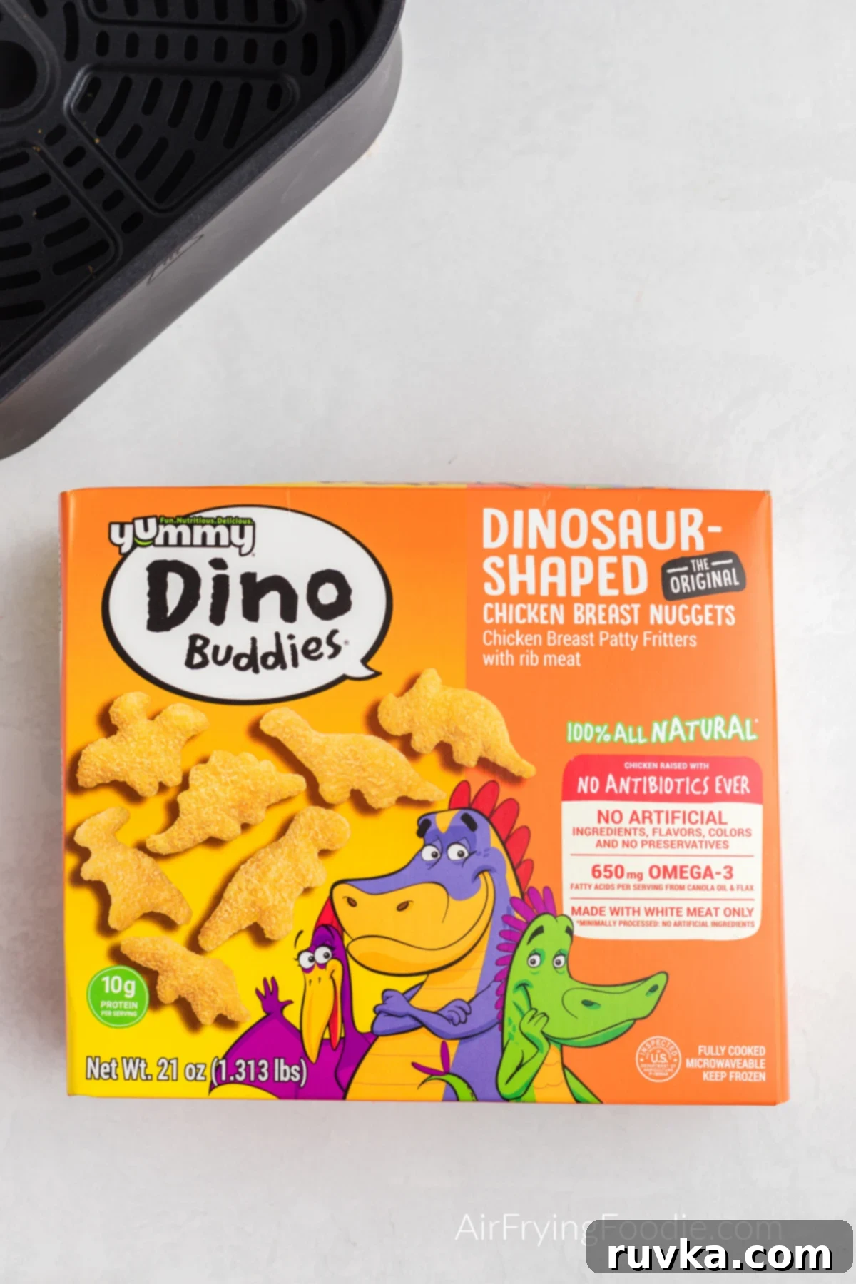 Crispy Air Fryer Dino Nuggets 3 A box of Yummy brand dinosaur chicken nuggets.