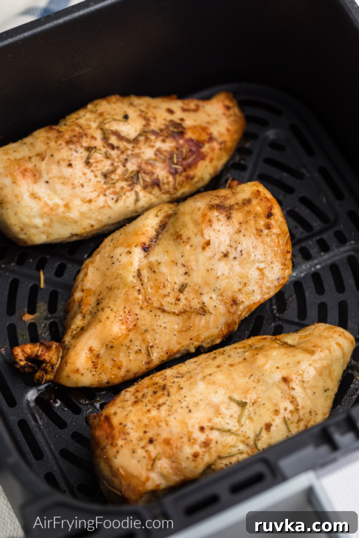 Juicy Air Fryer Grilled Chicken Breast 6 Seasoned grilled chicken breast in the air fryer.