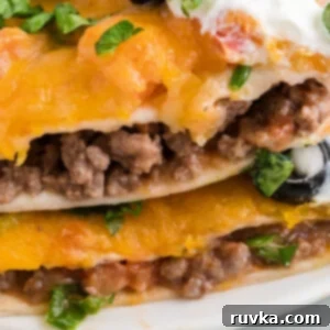 Air Fryer Fiesta Pizza 12 Air fryer Mexican Pizza close up photo of slices of pizza on a plate and ready to serve.
