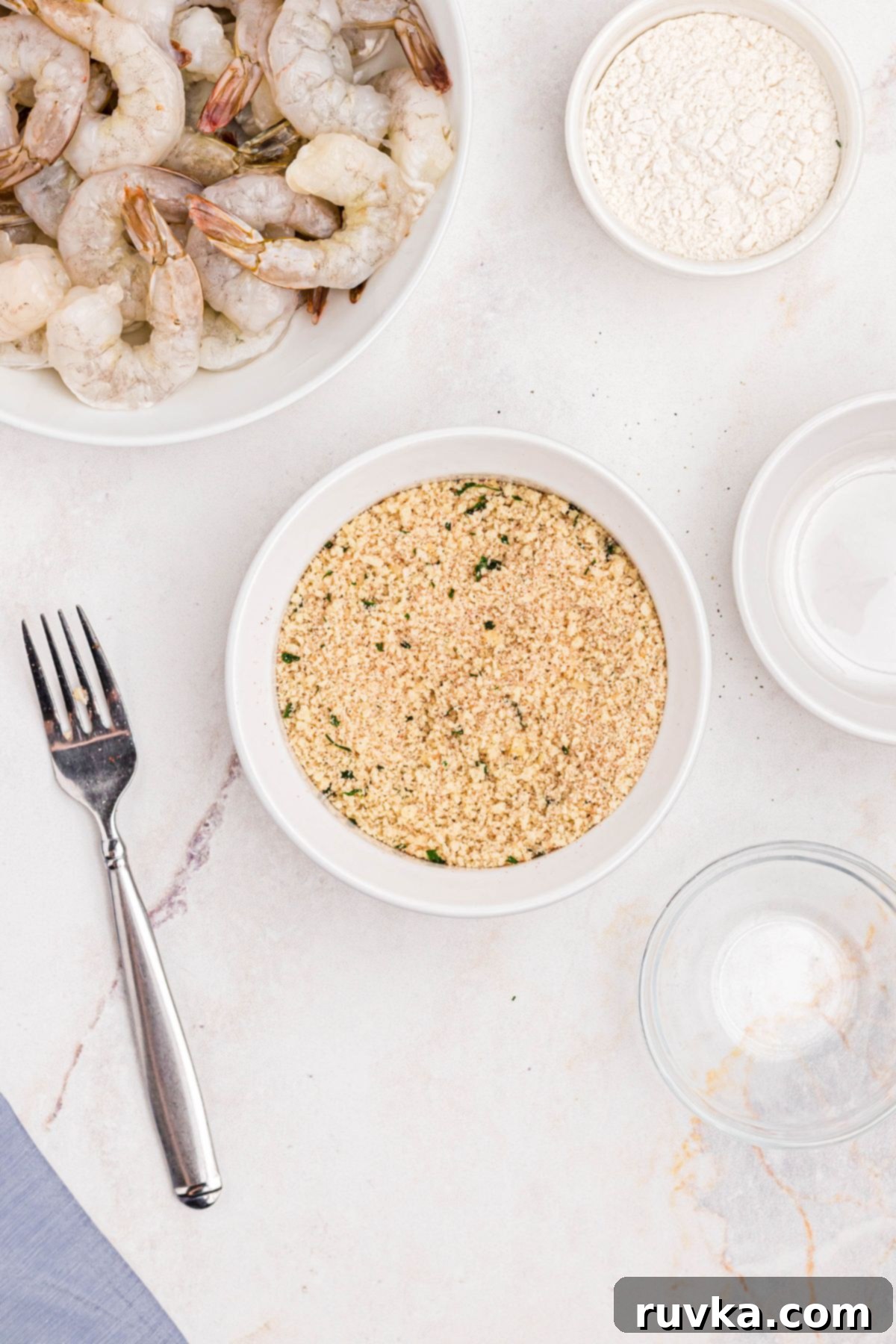 Crispy Air Fryer Breaded Shrimp 4 Parmesan cheese mixed with breadcrumbs and seasonings.