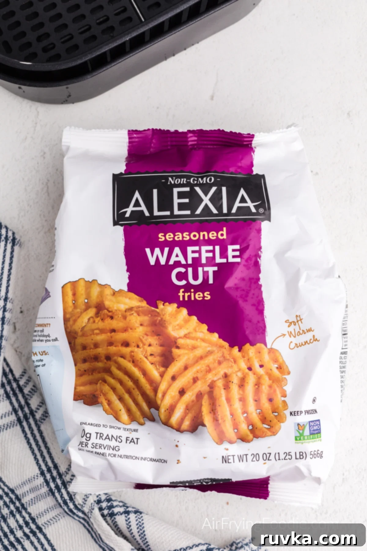 Crispy Air Fryer Waffle Fries 3 Frozen waffle fries in a bag, ready to be cooked in the air fryer.