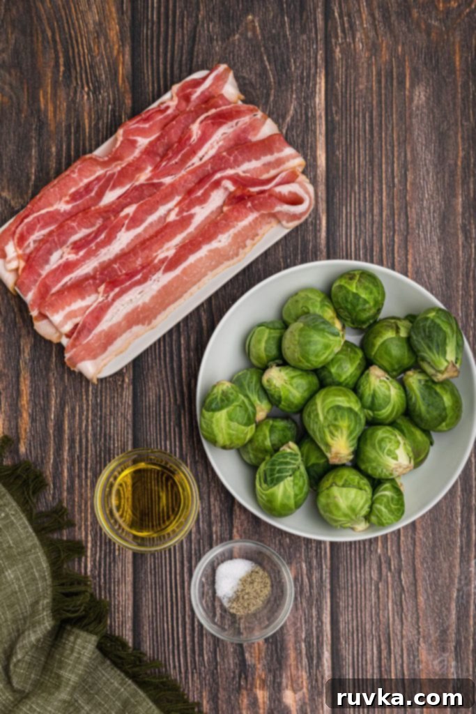 Crispy Air Fryer Brussels Sprouts and Bacon 3 Brussels sprouts, bacon, olive oil, and seasonings on a wooden table.
