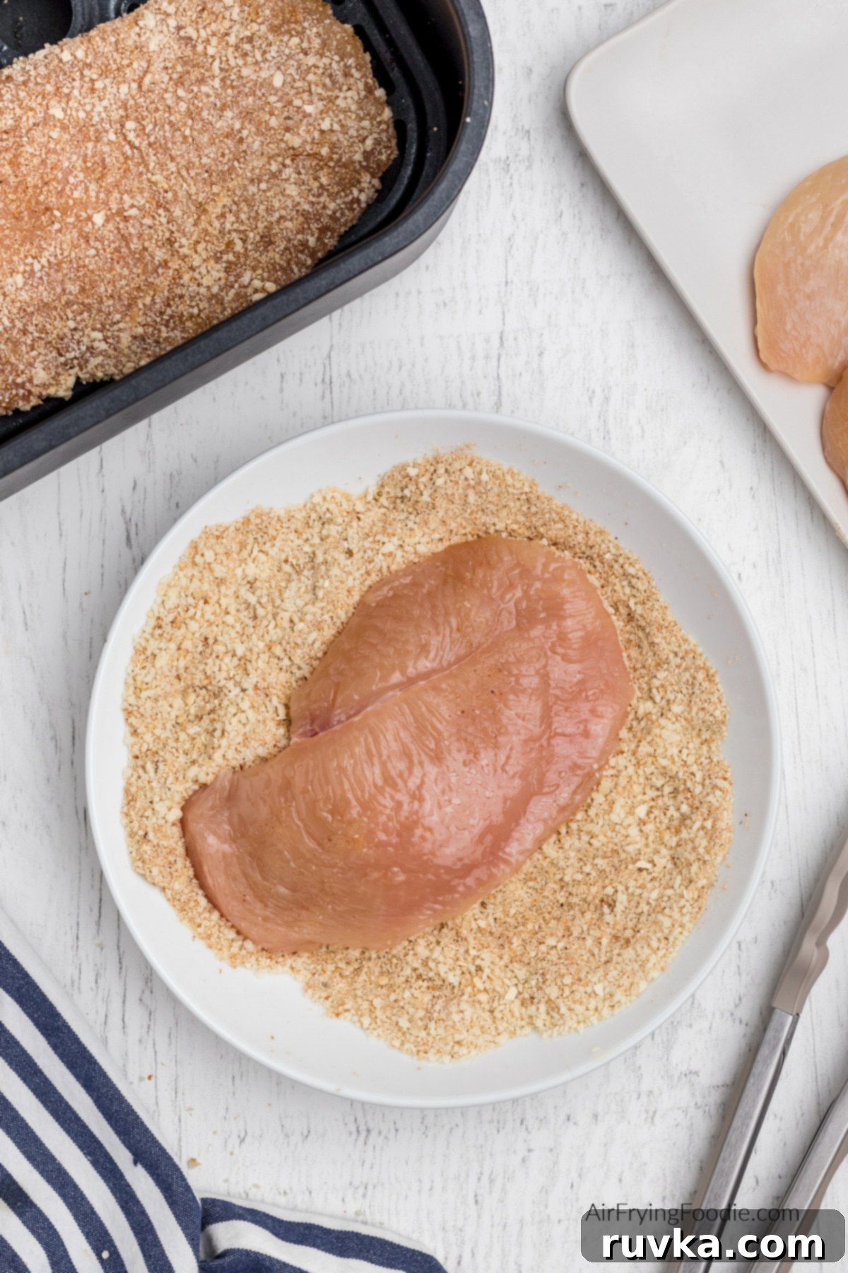 Crispy Air-Fried Chicken Breast 5 Chicken breast in the breadcrumb and seasoning mixture.