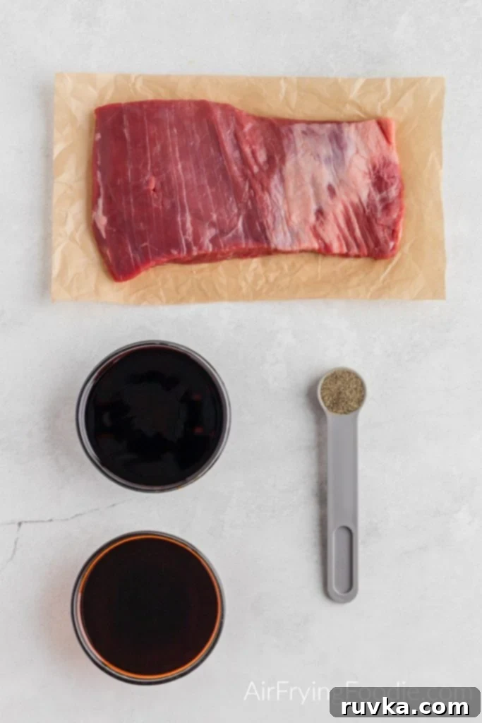 Homemade Air Fryer Jerky 3 flank steak, soy sauce, teriyaki sauce, and black pepper.
