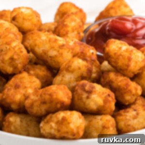 Air Frying Made Simple 11 Crispy Air Fryer Tater Tots, a perfect snack or side.