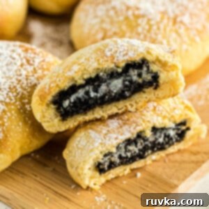 Air Frying Made Simple 14 Air Fryer Oreos on a cutting board and sprinkled with powdered sugar