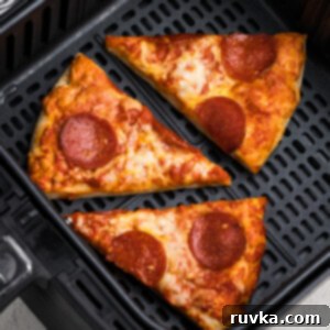 Air Frying Made Simple 15 Perfectly reheated pizza slices, crispy and hot.