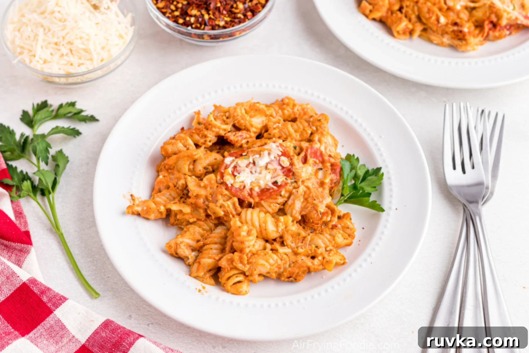 Air Fryer Pizza Pasta Bake 11 Pizza pasta on a plate, ready to eat.