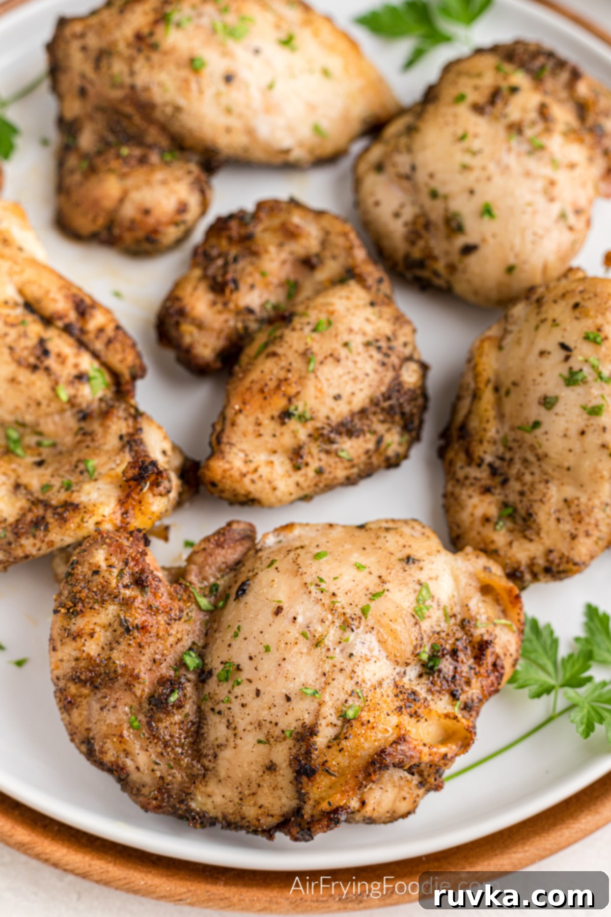 Crispy Air-Fried Chicken Thighs 7 Plated fried chicken breasts made in the air fryer.