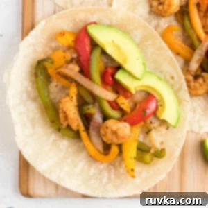 Effortless Air Fryer Shrimp Fajitas 10 Overhead of shrimp fajita ready to be eaten.
