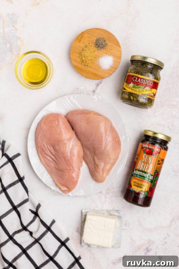 Crispy Air Fryer Stuffed Chicken 3 Ingredients needed to make stuffed chicken measured on a marble table.