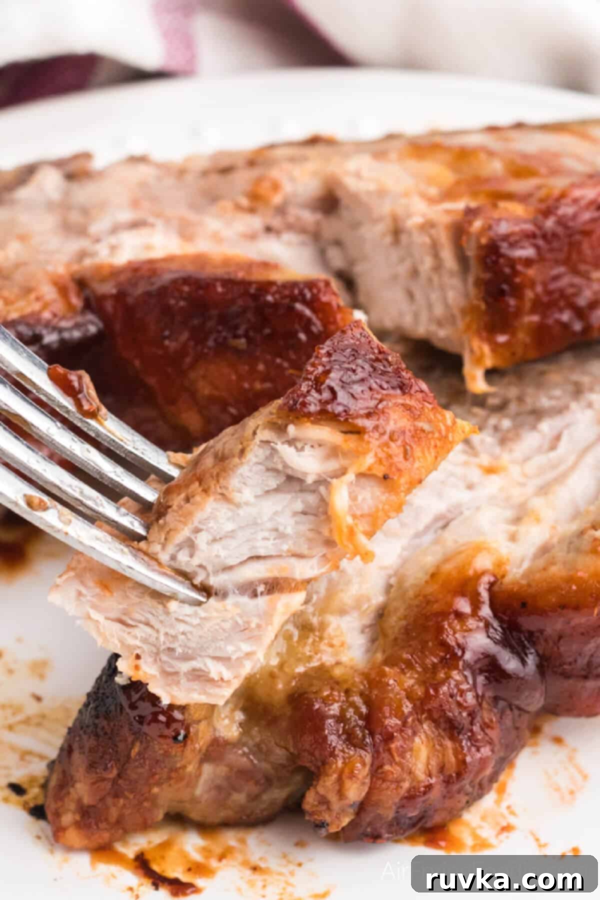 Mastering Air Fryer Leftovers for Crispy Results 7 fork with a bite of rib meat