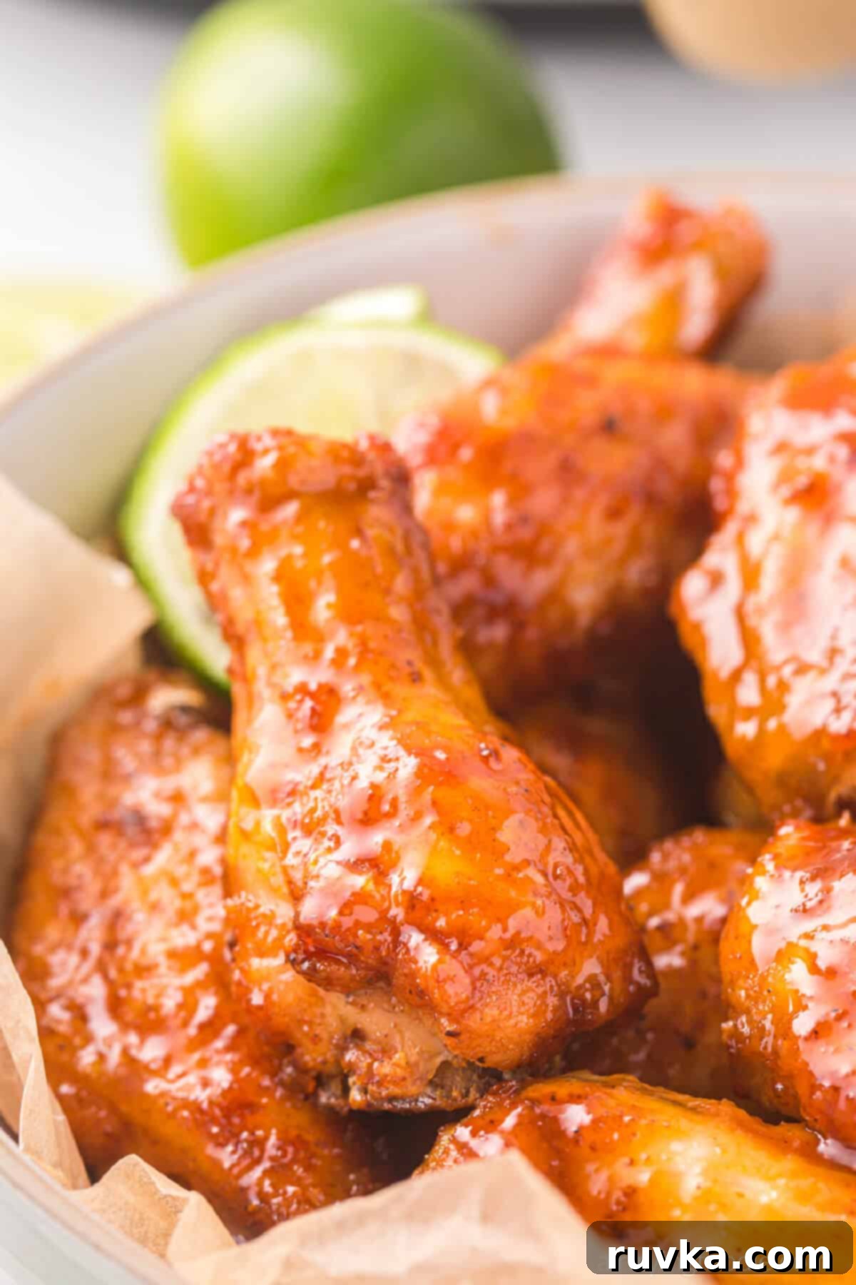 Air Fryer Magic for Crispy Leftover Wings 6 Reheated chicken wings in the air fryer then served in a bowl.