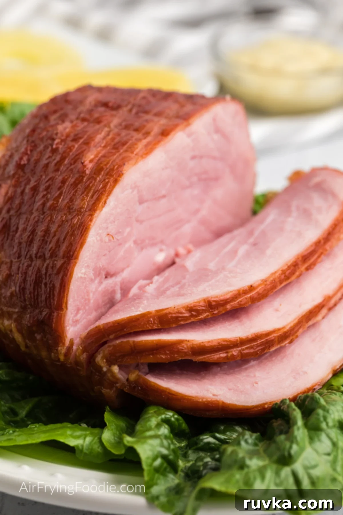 Effortless Holiday Feasts: 15 Air Fryer Recipes 13 sliced air fryer ham.