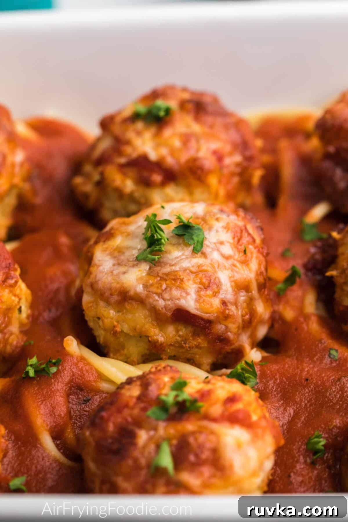 Sizzle into the New Year: 15 Air Fryer Recipes to Revolutionize Your Cooking 14 close up of parmesan meatballs