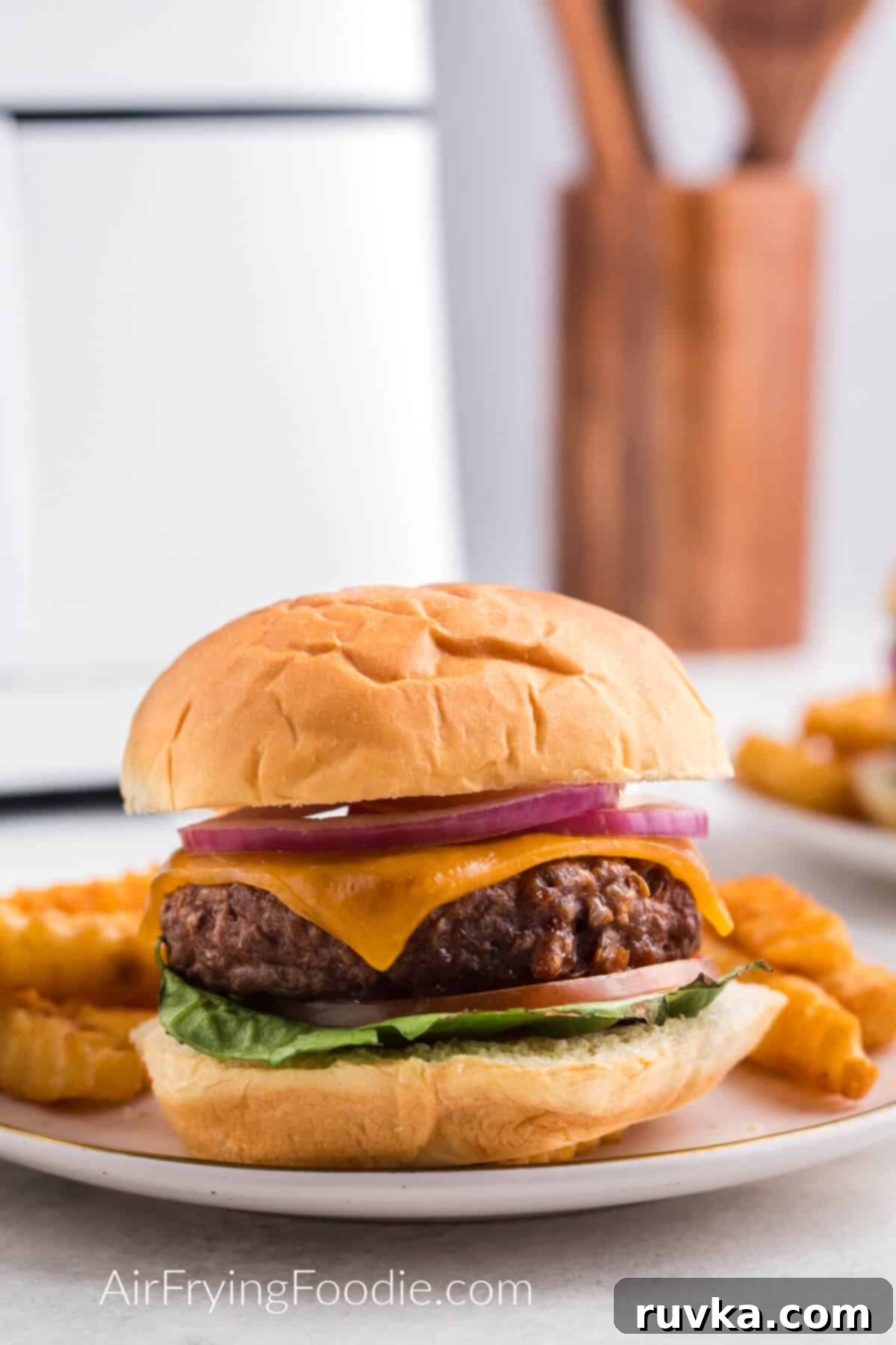 Easy Air Fryer Beyond Burger 2 Air fried Beyond burger served on a plate.