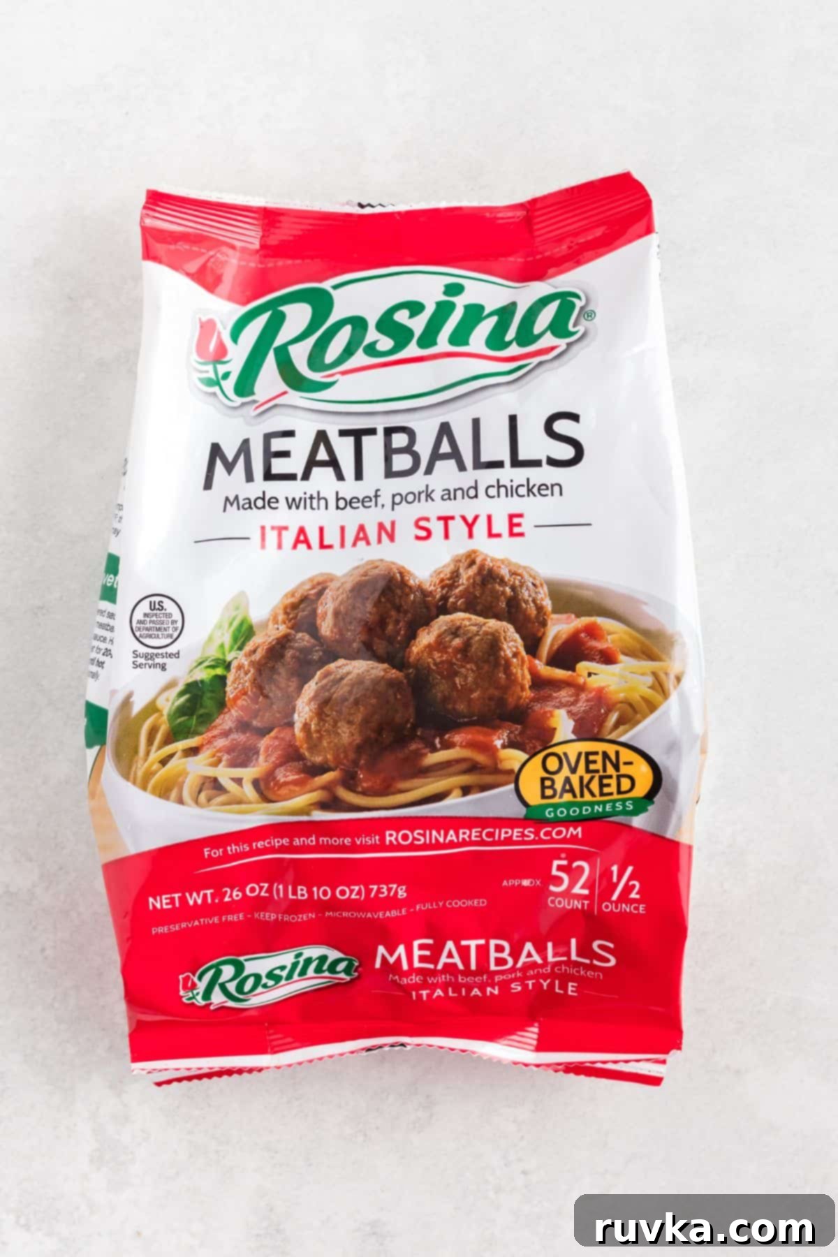 Quick Air Fryer Frozen Meatballs 4 Bag of frozen meatballs on a marble table.