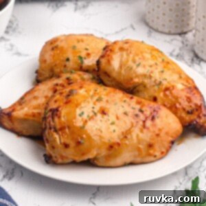 Golden Peach Air Fryer Chicken 10 Golden chicken breasts cooked with a shiny glaze of peach preserves and seasonings.