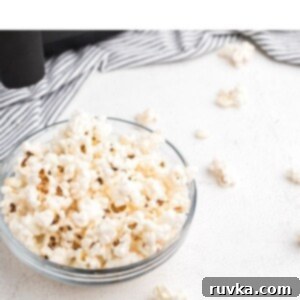 Keto Air Fryer Delights 5 Air Fryer Popcorn, a light and fluffy treat that's easy to make at home.