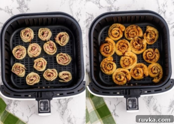 Crispy Air Fryer Pesto Pinwheels 5 Before and after comparison of pesto pinwheels cooking in an air fryer basket. One side shows raw pinwheels, the other shows golden-brown, crispy pinwheels.