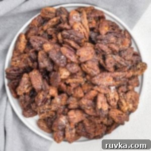 Golden Air Fryer Candied Pecans 10 Air fried candied pecans in a bowl, ready to serve.