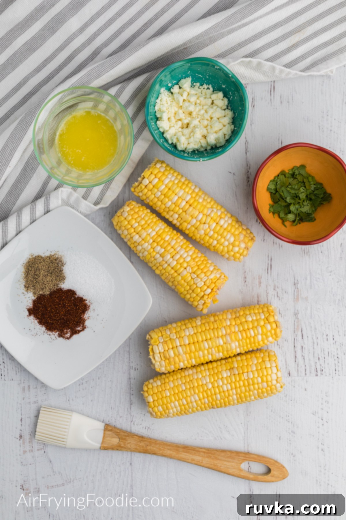 Crispy Air Fryer Elote 3 Ingredients needed to make mexican street corn in the air fryer.