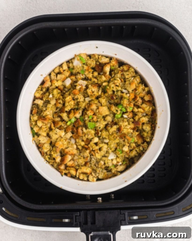 Perfectly Crispy Air Fryer Stuffing 7 Golden stuffing after being cooked in the air fryer basket.
