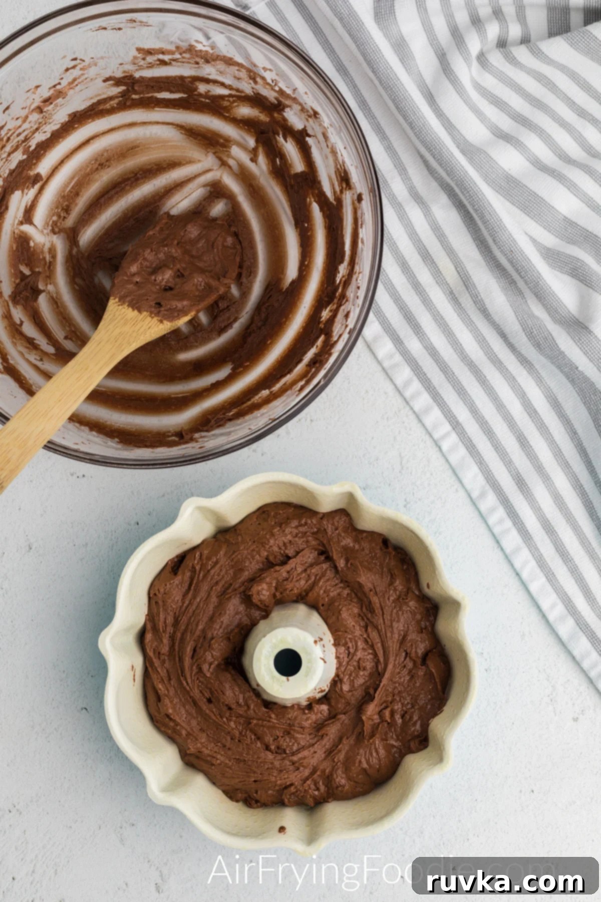 Irresistible Air Fryer Chocolate Bundt 7 Rich chocolate cake batter carefully poured into a prepared 6-inch bundt pan, ready for the air fryer.