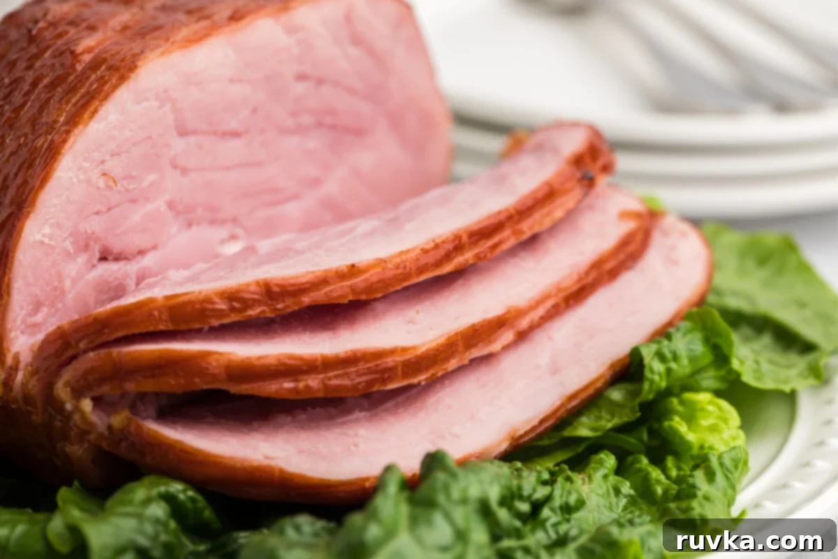 Crispy Air Fryer Ham 8 Close up photo of air fryer ham sliced and ready to serve, showing the delicious glaze.