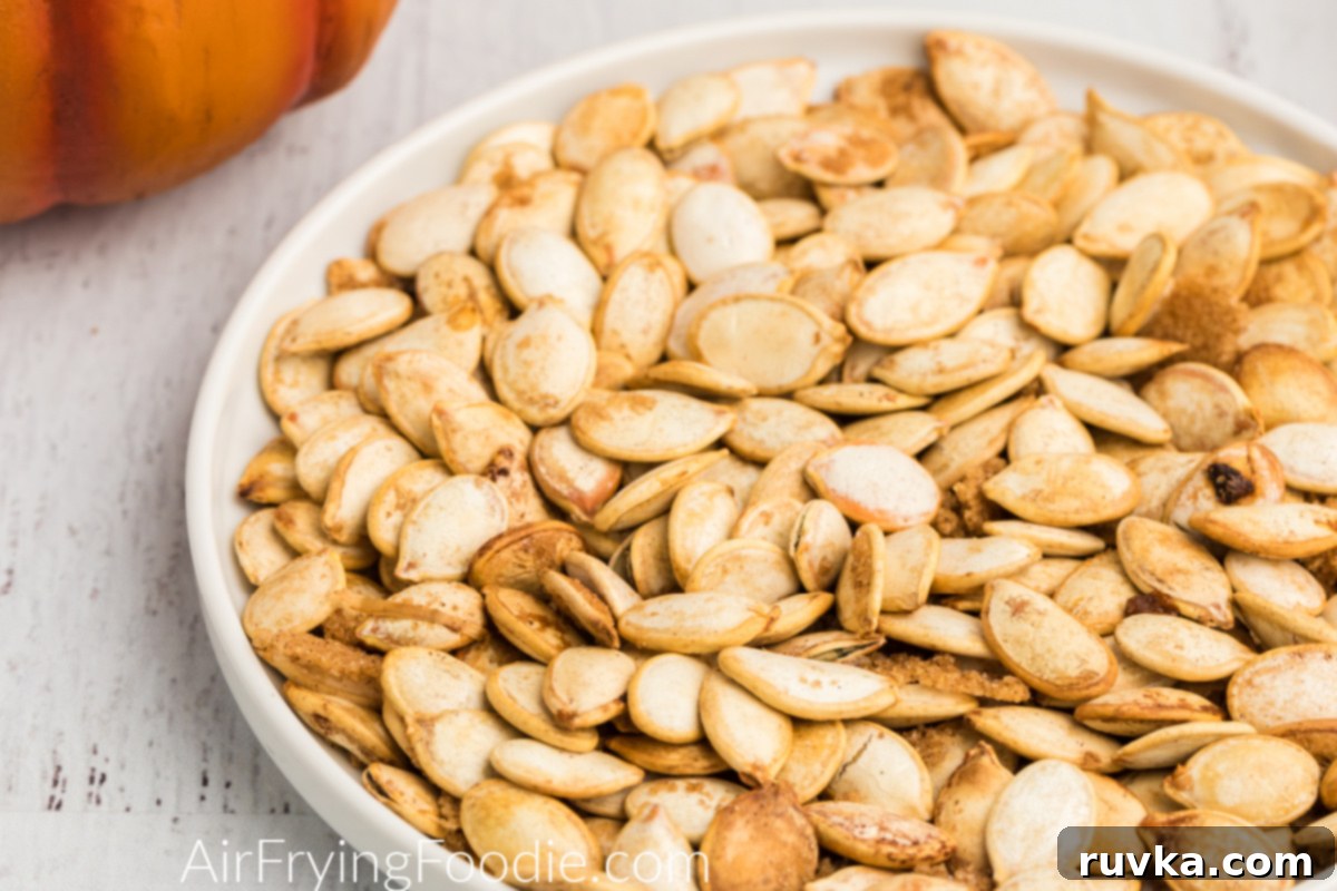 Crispy Air Fryer Pumpkin Seeds 5 Close up photo of roasted pumpkin seeds made in the air fryer.