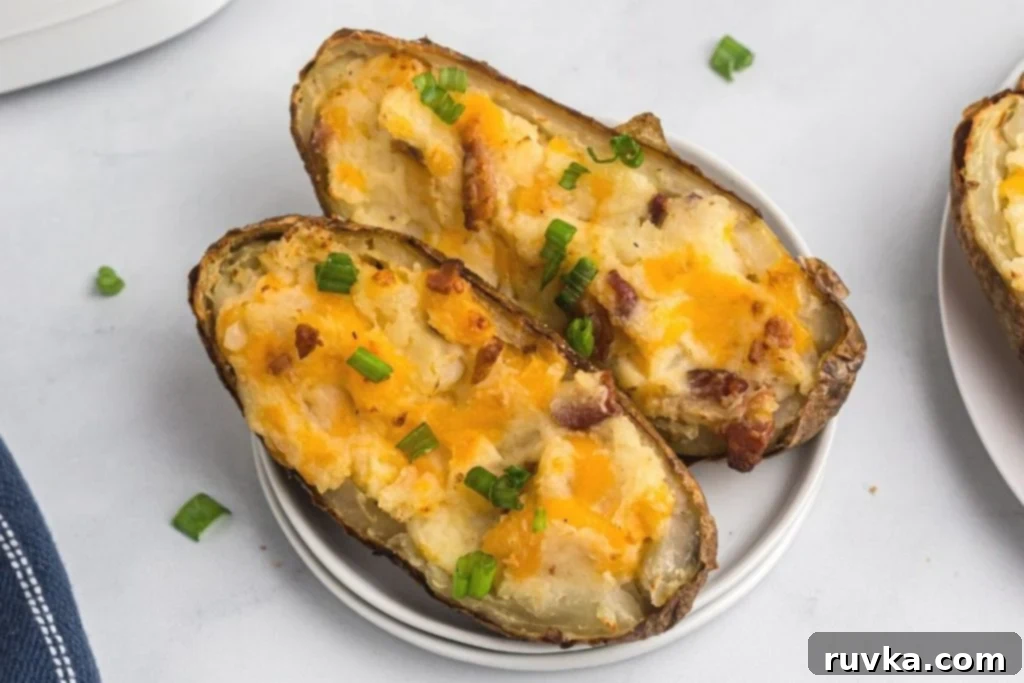 Ultimate Air Fryer Twice Baked Potatoes 9 Close up of twice baked filled potatoes