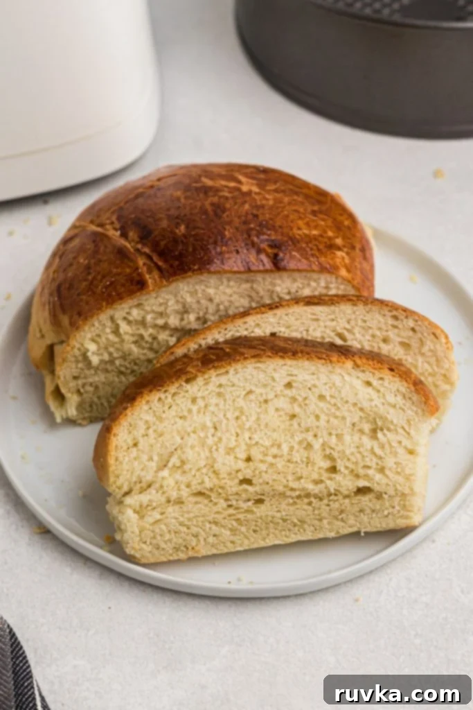 Bake Bread in Your Air Fryer 2 Air fryer bread sliced and baked with a golden crust