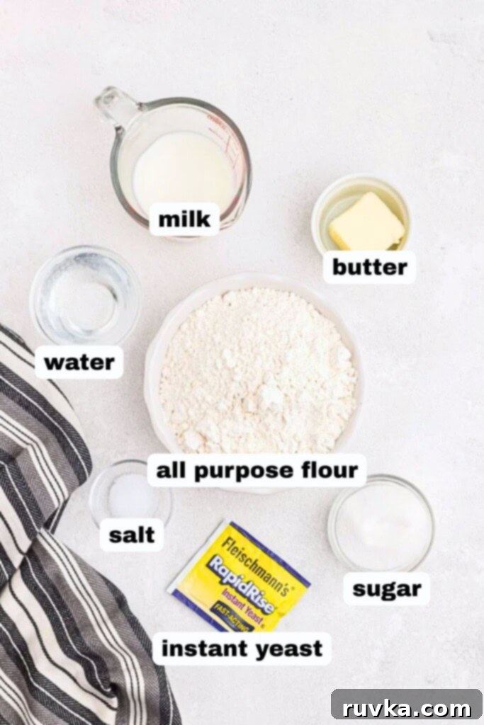 Bake Bread in Your Air Fryer 3 Ingredients needed to make bread, measured in small glass bowls on a marble table.