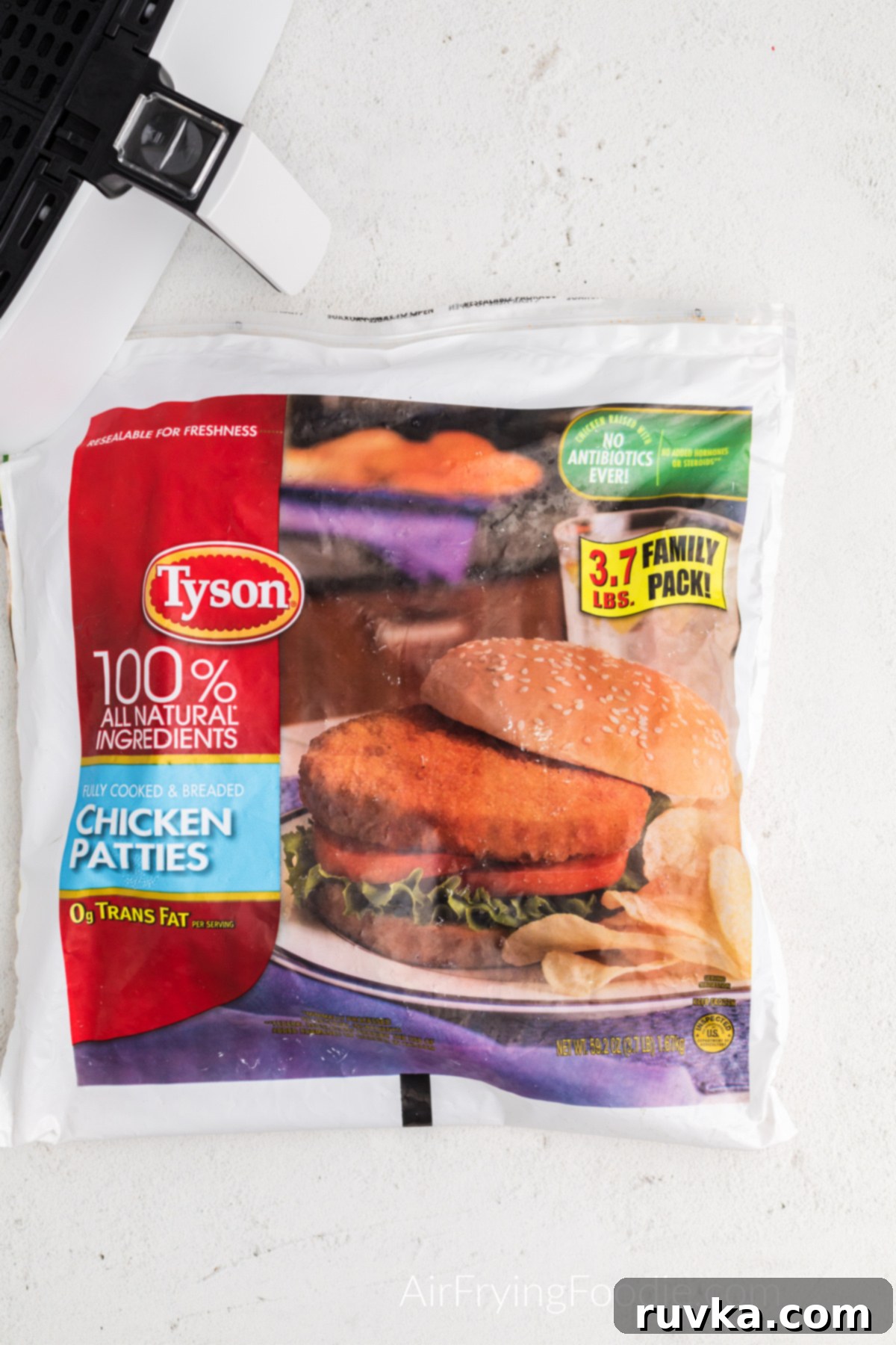 Quick and Crispy Air Fryer Frozen Chicken Patties 3 Two frozen chicken patties in their packaging, ready to be cooked in an air fryer.