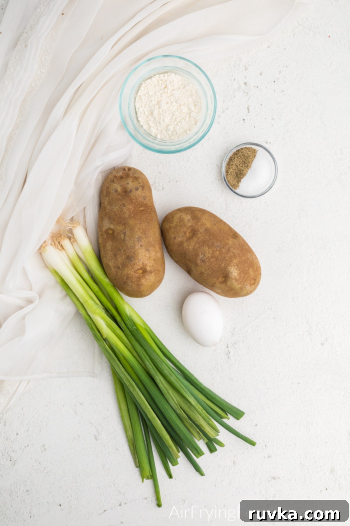 Crispy Air Fryer Latkes 3 Ingredients needed to make latkes in the air fryer.