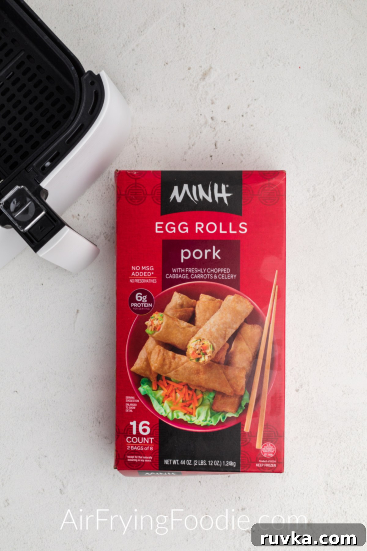 Crispy Frozen Egg Rolls in Air Fryer 3 Minh frozen egg rolls in a box ready to be cooked in the air fryer.