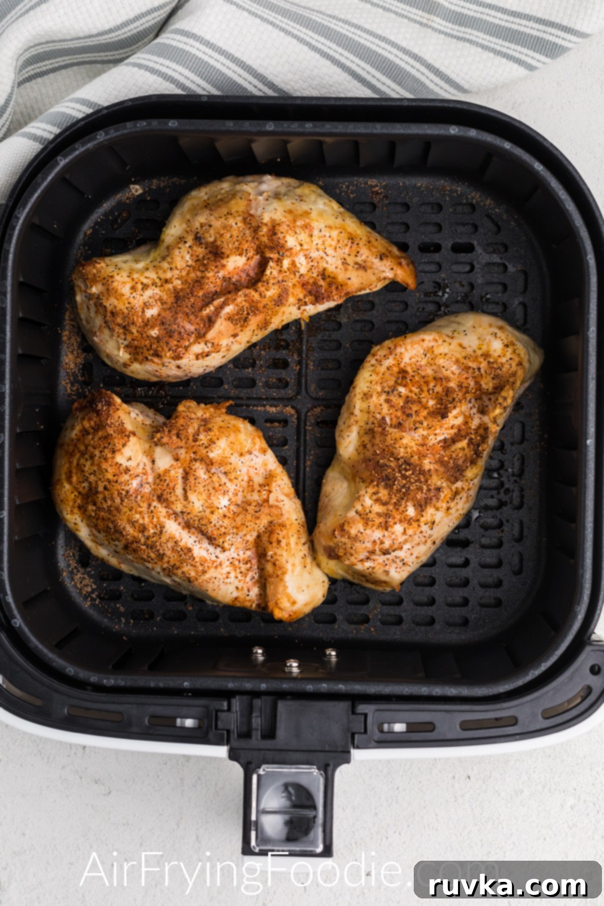 Perfect Air Fryer Frozen Chicken Breast 4 Fully cooked chicken breasts that were cooked from frozen in the air fryer.