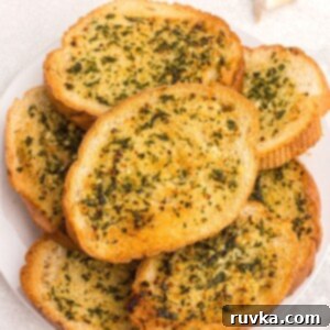 Frozen Food Favorites for the Air Fryer 14 Golden toasted garlic bread, perfectly cooked in the air fryer, glistening with butter and herbs.
